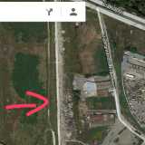 Panoramica dell'accampamento rom del canalone: le case di cartone e i rifiuti si vedono anche dal satellite di Google Maps